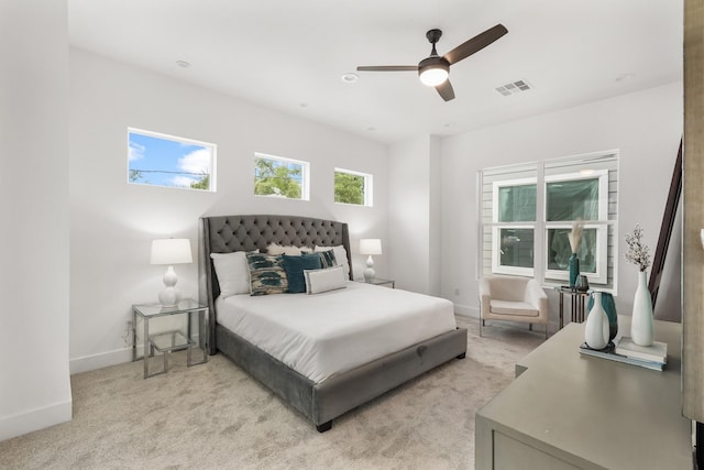 2022 Thonig Rd Unit C, Houston, TX 77055 - bedroom featuring light colored carpet, baseboards, and ceiling fan