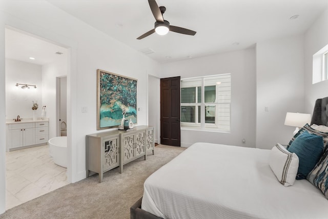 2022 Thonig Rd Unit C, Houston, TX 77055 - bedroom with a sink, ensuite bath, ceiling fan, and light marble finish flooring