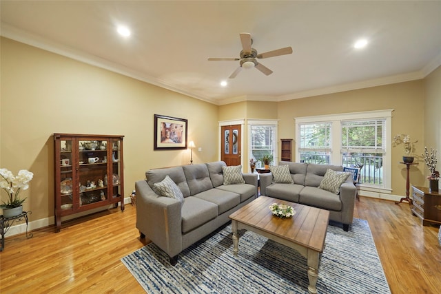 606 E 27th St, Houston, TX 77008 - living room featuring a ceiling fan, light wood finished floors, recessed lighting, baseboards, and ornamental molding