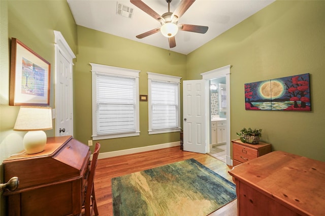 606 E 27th St, Houston, TX 77008 - office space featuring wood finished floors, ceiling fan, and baseboards