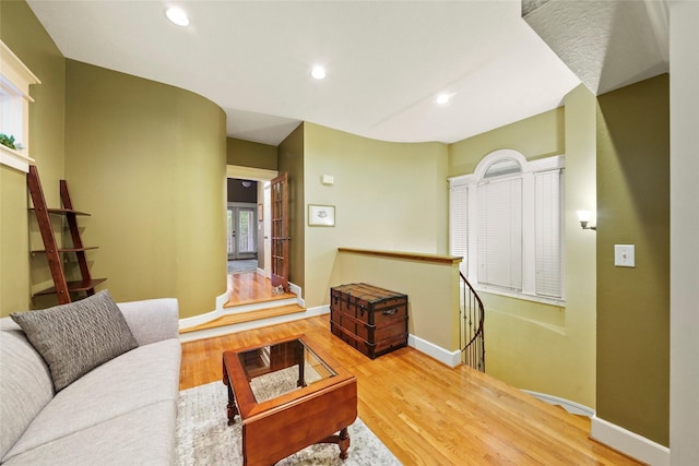 606 E 27th St, Houston, TX 77008 - living room with wood finished floors, recessed lighting, and baseboards