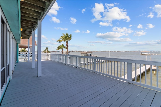 1022 Darcy St, Galveston, TX 77554 - wooden deck with a water view