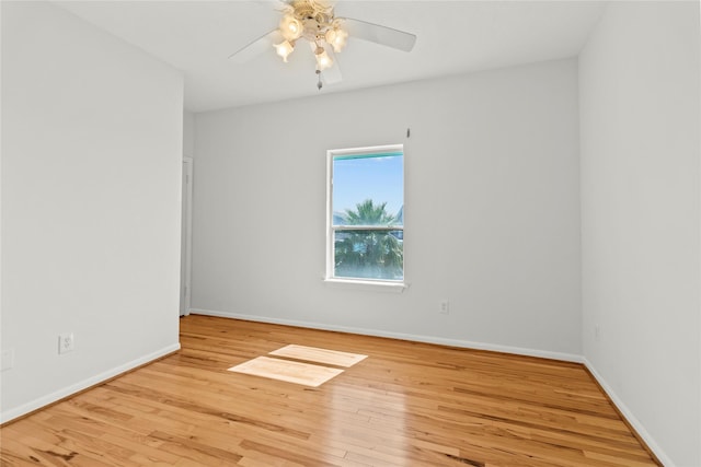 1022 Darcy St, Galveston, TX 77554 - unfurnished room featuring wood finished floors, baseboards, and ceiling fan