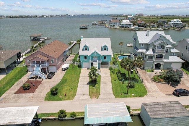 1022 Darcy St, Galveston, TX 77554 - aerial perspective of suburban area featuring a nearby body of water