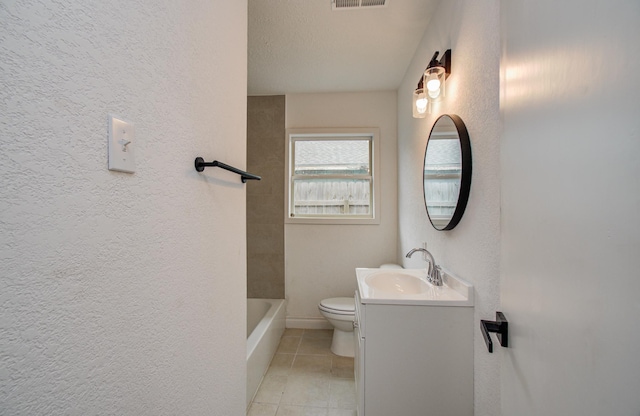 2020 Vince St, Pasadena, TX 77502 - full bath featuring a textured wall, vanity, toilet, and tile patterned floors