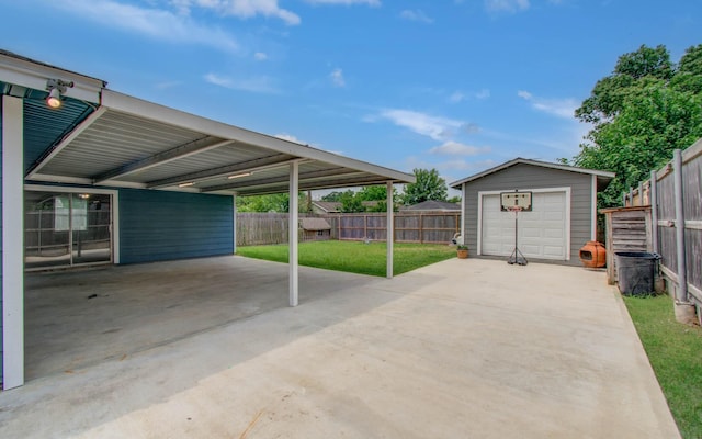 2020 Vince St, Pasadena, TX 77502 - view of patio with an outbuilding and a detached garage