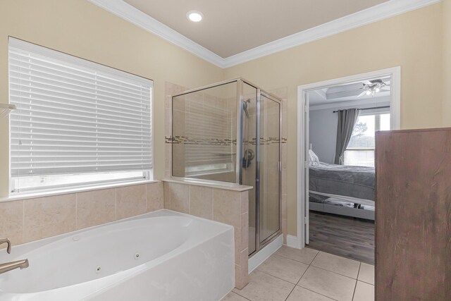 26010 Pagemill Ln, Richmond, TX 77406 - ensuite bathroom featuring tile patterned floors, a tub with jets, ornamental molding, a stall shower, and recessed lighting