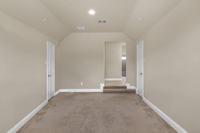26010 Pagemill Ln, Richmond, TX 77406 - empty room featuring carpet floors, lofted ceiling, and baseboards