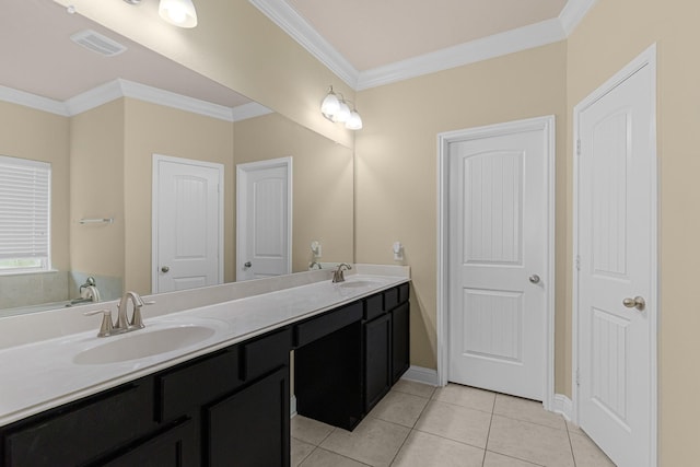 26010 Pagemill Ln, Richmond, TX 77406 - full bathroom featuring double vanity, ornamental molding, tile patterned flooring, and baseboards