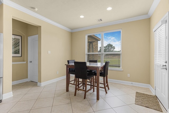 26010 Pagemill Ln, Richmond, TX 77406 - dining room with crown molding, healthy amount of natural light, light tile patterned flooring, recessed lighting, and baseboards