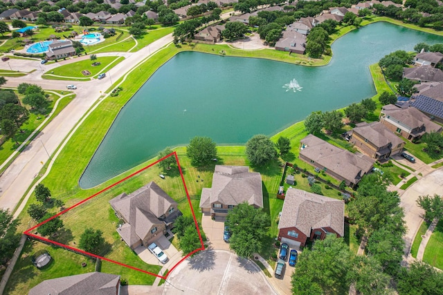 26010 Pagemill Ln, Richmond, TX 77406 - aerial view of residential area with a nearby body of water and property boundaries highlighted