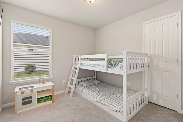 4423 Olive Field Ct, Richmond, TX 77469 - bedroom featuring multiple windows, carpet floors, and baseboards