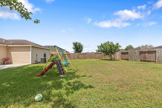 4423 Olive Field Ct, Richmond, TX 77469 - view of yard with a playground and a patio