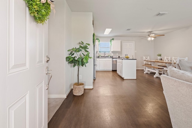 4423 Olive Field Ct, Richmond, TX 77469 - entryway with dark wood finished floors, a ceiling fan, and baseboards