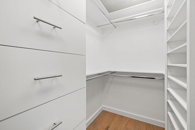 5747 Jackwood St, Houston, TX 77096 - walk in closet featuring wood finished floors