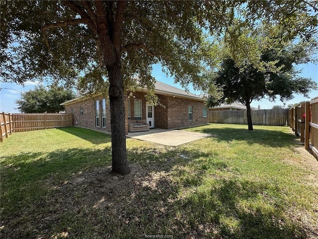 1027 Emerald Dove Ave, College Station, TX 77845 - view of yard featuring a patio area