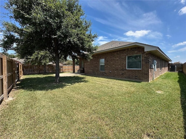 1027 Emerald Dove Ave, College Station, TX 77845 - view of yard featuring central air condition unit