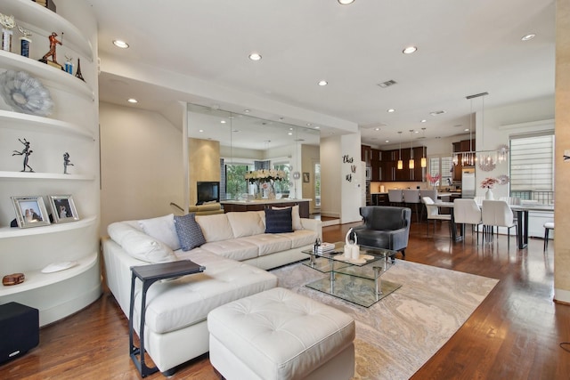 4129 Dickson St, Houston, TX 77007 - living area featuring recessed lighting and wood finished floors
