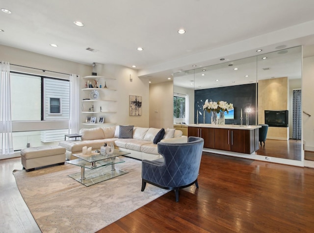 4129 Dickson St, Houston, TX 77007 - living room featuring dark wood finished floors and recessed lighting