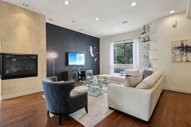 4129 Dickson St, Houston, TX 77007 - living room featuring recessed lighting, baseboards, and wood finished floors