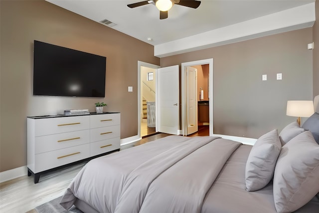 4129 Dickson St, Houston, TX 77007 - bedroom featuring light wood-type flooring, baseboards, and ceiling fan