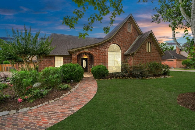 1207 W Edgewood Dr, Friendswood, TX 77546 - view of front of property with brick siding and roof with shingles