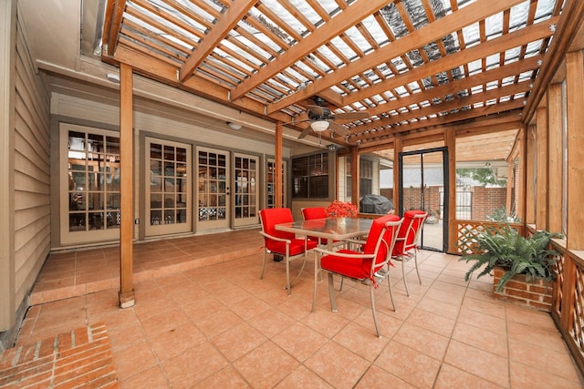 1207 W Edgewood Dr, Friendswood, TX 77546 - sunroom / solarium featuring a ceiling fan and outdoor dining area