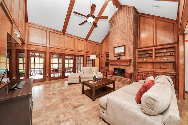 1207 W Edgewood Dr, Friendswood, TX 77546 - living area with high vaulted ceiling, a ceiling fan, a brick fireplace, wood walls, and beam ceiling