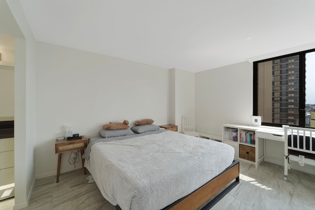 3525 Sage Rd Unit 1104, Houston, TX 77056 - bedroom with baseboards