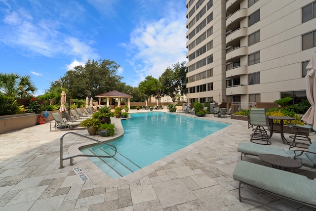 3525 Sage Rd Unit 1104, Houston, TX 77056 - community pool featuring a gazebo and a patio area