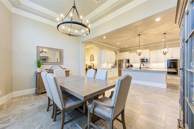 28907 Copper Break Ct, Katy, TX 77494 - dining space with a chandelier, ornamental molding, recessed lighting, baseboards, and a raised ceiling