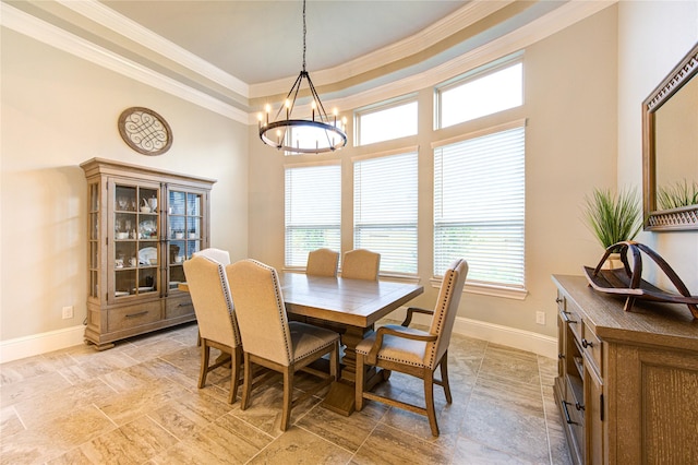 28907 Copper Break Ct, Katy, TX 77494 - dining space featuring crown molding, a chandelier, baseboards, light stone finish flooring, and a towering ceiling