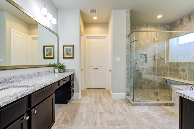 28907 Copper Break Ct, Katy, TX 77494 - full bathroom with vanity, a shower stall, baseboards, and recessed lighting