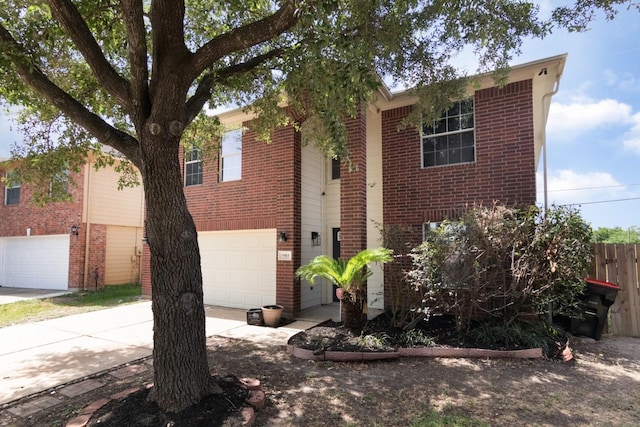 5903 Bonners Park Ct, Katy, TX 77449 - view of front facade featuring a garage, brick siding, and concrete driveway