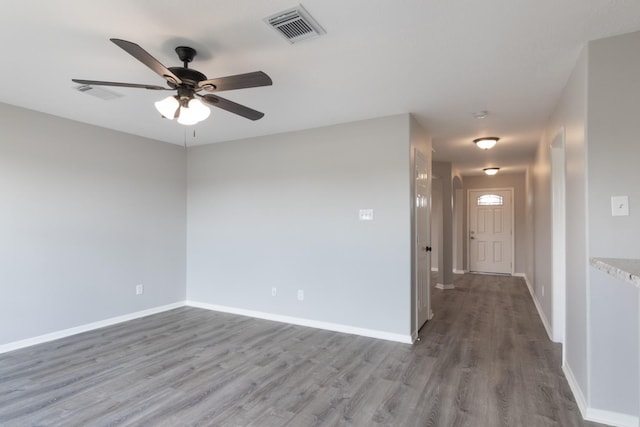 5903 Bonners Park Ct, Katy, TX 77449 - spare room featuring wood finished floors, a ceiling fan, and baseboards