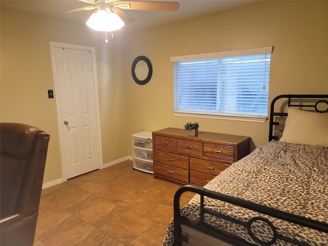 3501 Carson Ct, Pearland, TX 77584 - bedroom featuring baseboards and ceiling fan