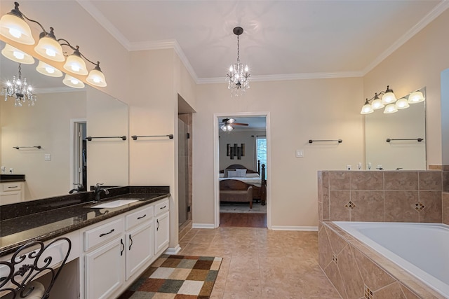 11203 Chestnut Woods Trl, Houston, TX 77065 - bathroom featuring a chandelier, vanity, ornamental molding, a garden tub, and a ceiling fan