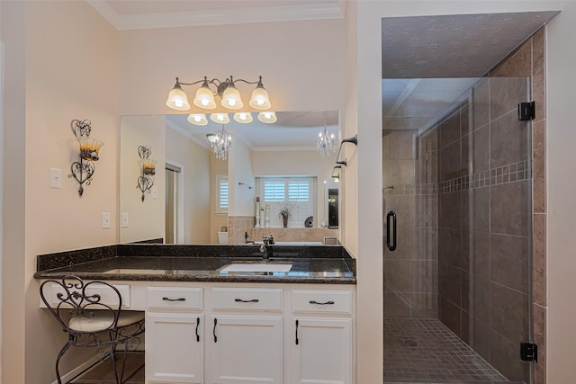 11203 Chestnut Woods Trl, Houston, TX 77065 - full bathroom featuring crown molding, a stall shower, vanity, and a chandelier