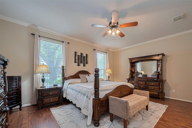 11203 Chestnut Woods Trl, Houston, TX 77065 - bedroom featuring dark wood-style floors, crown molding, baseboards, and a ceiling fan