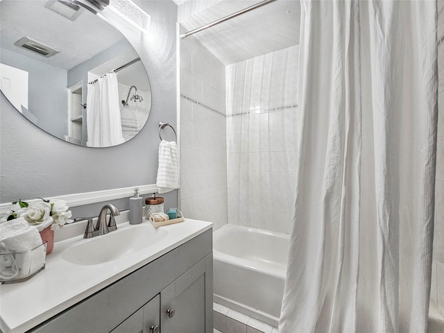 723 Pas Trl, Houston, TX 77336 - bathroom featuring vanity, shower / bath combo, and tile patterned floors