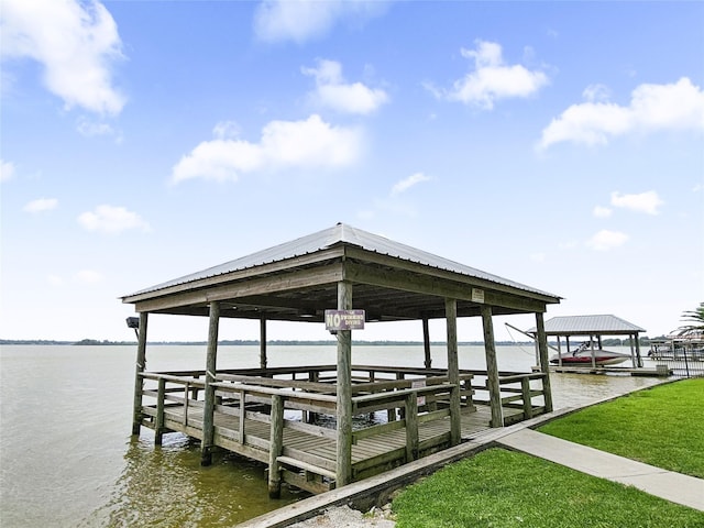 723 Pas Trl, Houston, TX 77336 - dock area featuring a water view, a lawn, and boat lift
