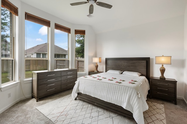 17102 Crimson Crest Dr, Conroe, TX 77302 - bedroom featuring light carpet, baseboards, and a ceiling fan