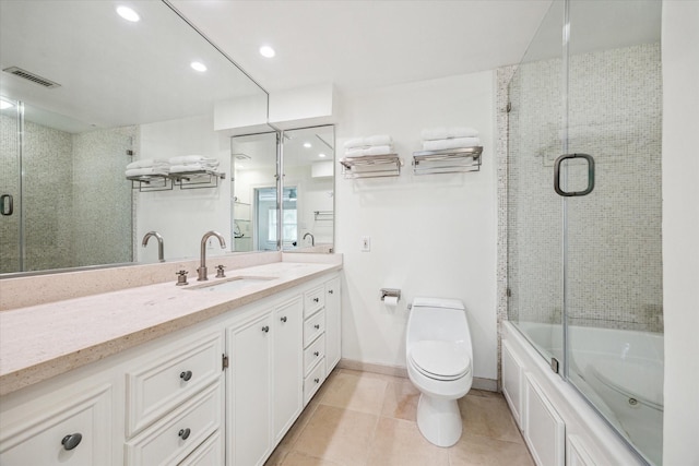 2415 Avalon Pl, Houston, TX 77019 - bathroom with vanity, tile patterned floors, toilet, and recessed lighting
