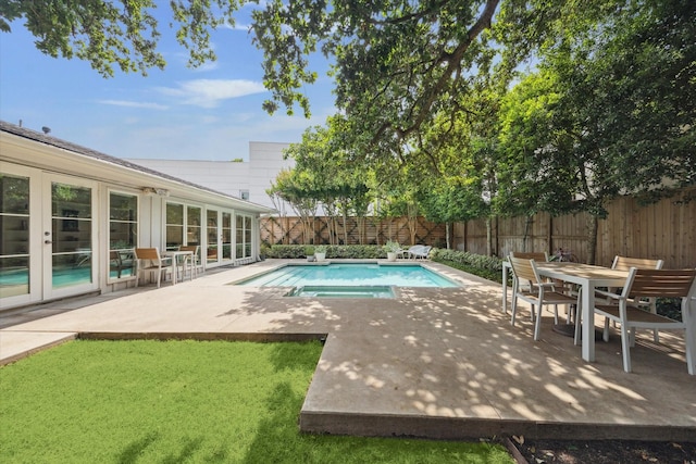 2415 Avalon Pl, Houston, TX 77019 - view of pool with a fenced backyard, a patio, and french doors