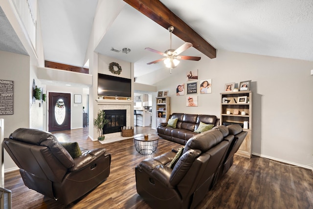 3808 Cottonwood Dr, La Porte, TX 77571 - living room featuring ceiling fan, a fireplace with flush hearth, dark wood-type flooring, and baseboards