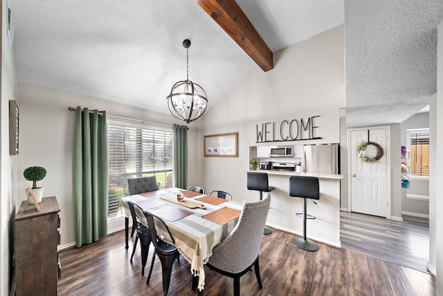 3808 Cottonwood Dr, La Porte, TX 77571 - dining room with a textured ceiling, healthy amount of natural light, a chandelier, dark wood finished floors, and baseboards
