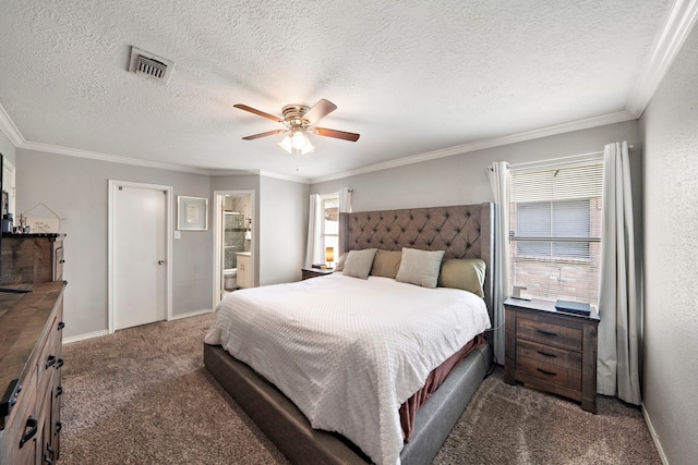 3808 Cottonwood Dr, La Porte, TX 77571 - carpeted bedroom with crown molding, a textured ceiling, a ceiling fan, baseboards, and ensuite bath