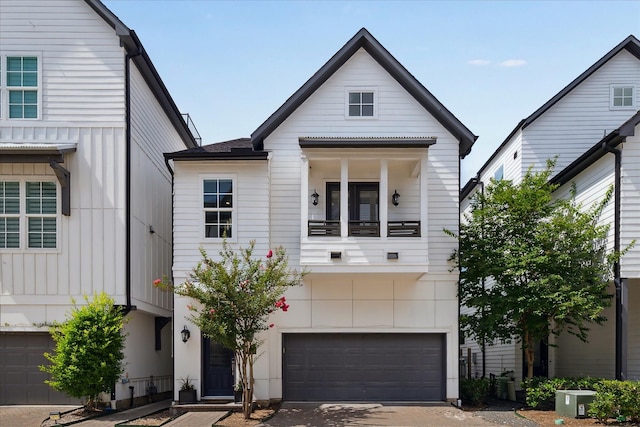3410 Timbergrove Heights St, Houston, TX 77008 - view of front of house with a garage, driveway, and board and batten siding