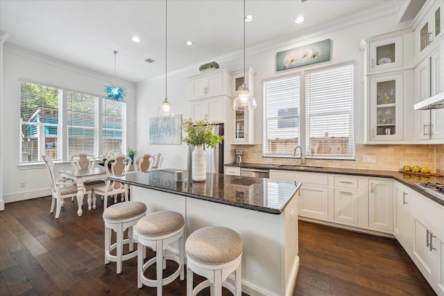 3410 Timbergrove Heights St, Houston, TX 77008 - kitchen with a sink, ornamental molding, tasteful backsplash, white cabinets, and recessed lighting