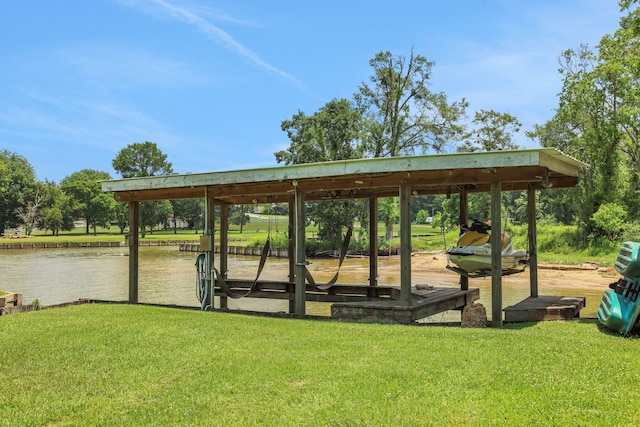 151 Lakeview Cir, Coldspring, TX 77331 - surrounding community with a yard and a water view